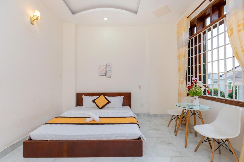 Postel nebo postele na pokoji v ubytování Homestay Bãi Sau - 5 phòng ngủ - 30 Võ Thị Sáu - Free karaoke