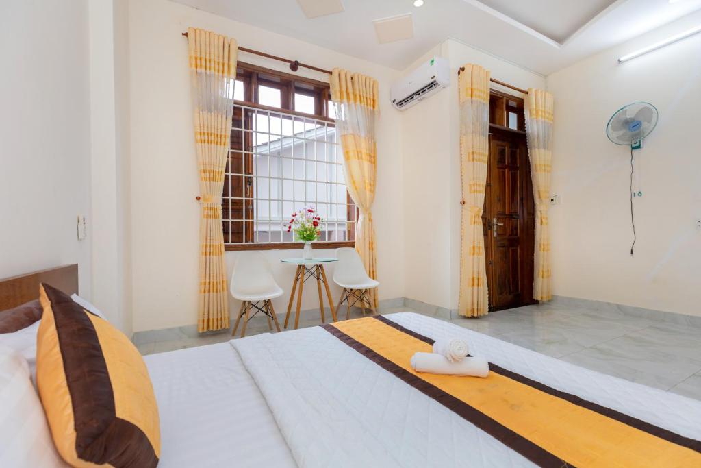 Postel nebo postele na pokoji v ubytování Homestay Bãi Sau - 5 phòng ngủ - 30 Võ Thị Sáu - Free karaoke