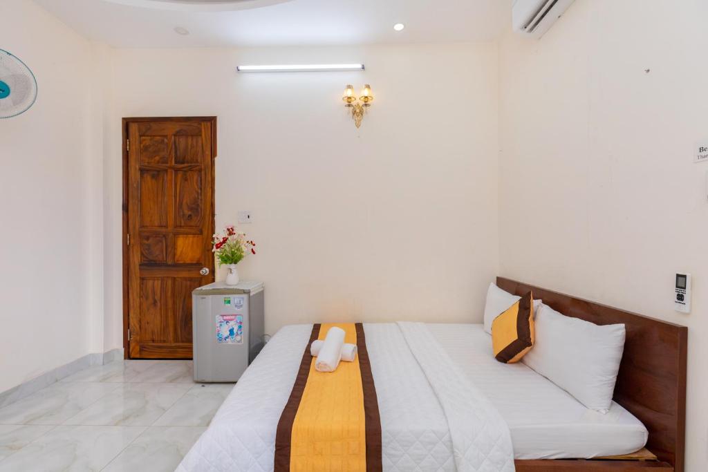 Postel nebo postele na pokoji v ubytování Homestay Bãi Sau - 5 phòng ngủ - 30 Võ Thị Sáu - Free karaoke