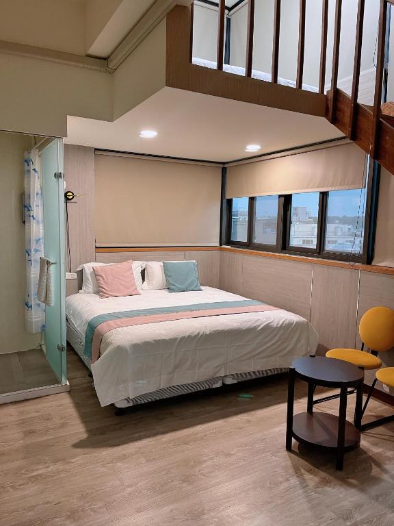 Postel nebo postele na pokoji v ubytování Xianwang Homestay