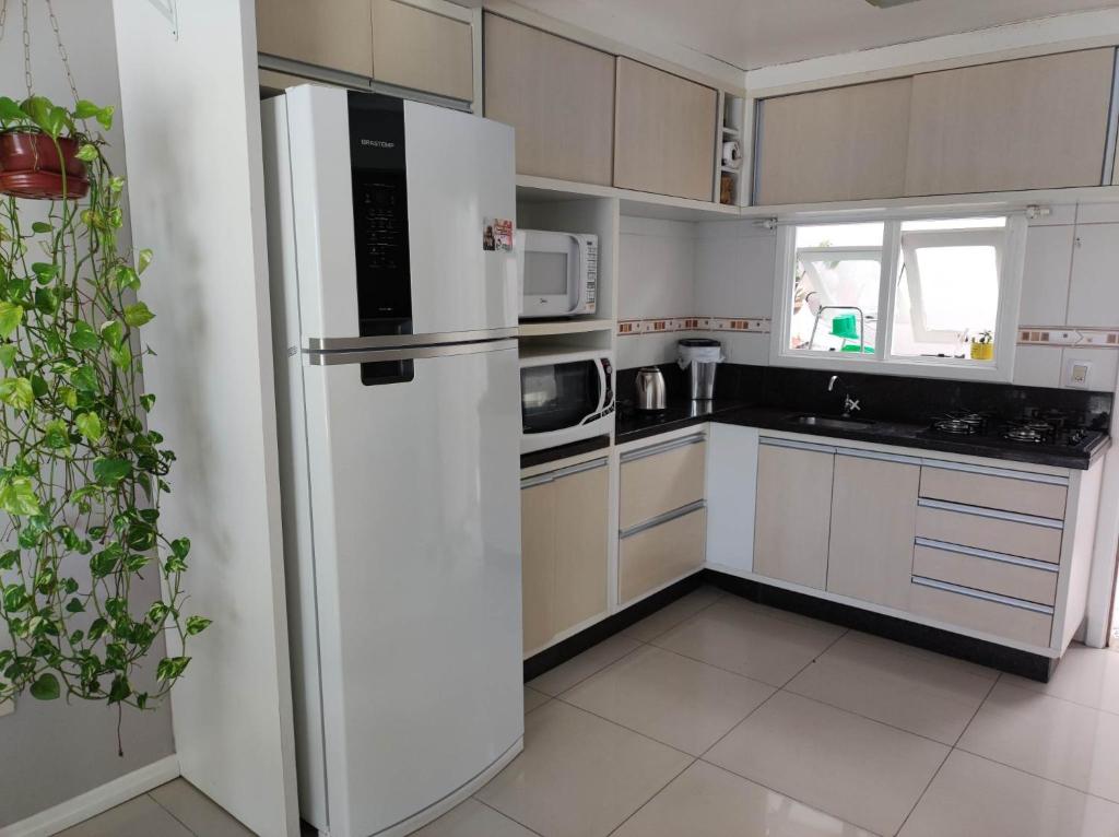Kuchyň nebo kuchyňský kout v ubytování Residencial Gemine