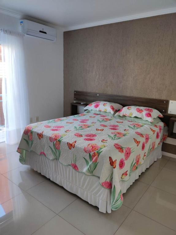 Postel nebo postele na pokoji v ubytování Residencial Gemine
