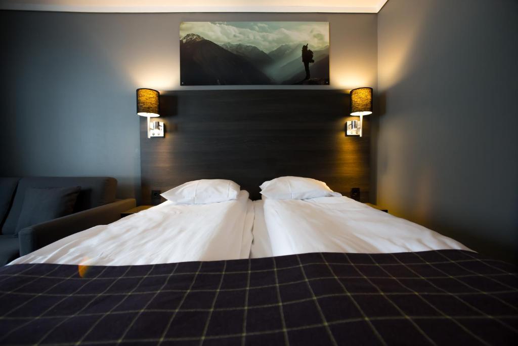 Postel nebo postele na pokoji v ubytování Geilo Hotel