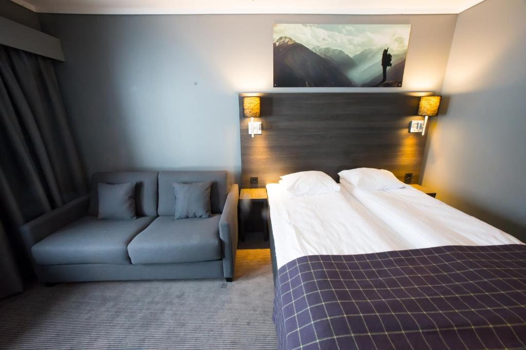 Postel nebo postele na pokoji v ubytování Geilo Hotel