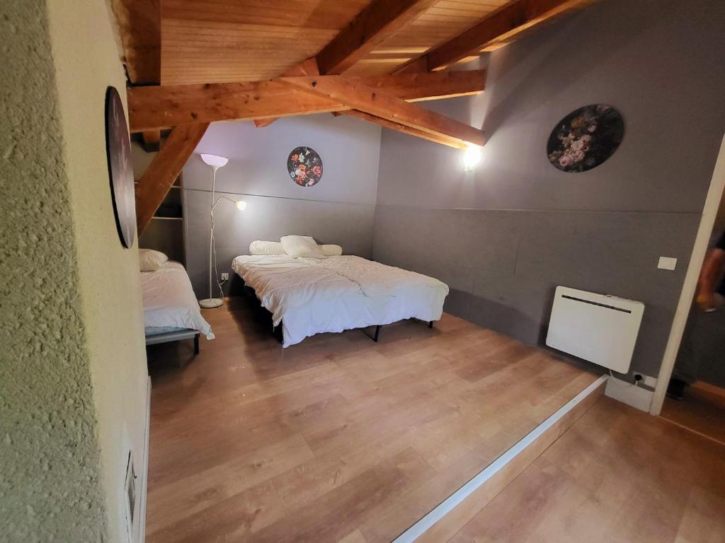 Postel nebo postele na pokoji v ubytování Chez Mike