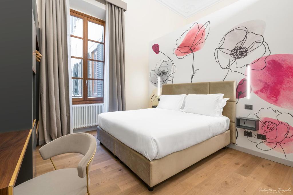 Postel nebo postele na pokoji v ubytování Hotel Adamas
