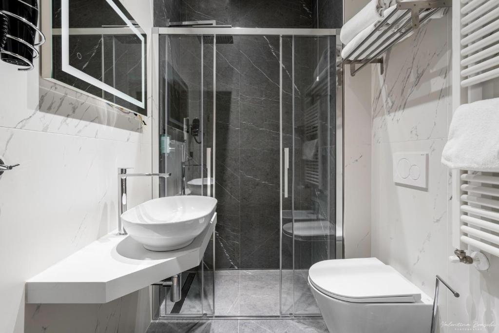 Koupelna v ubytování Hotel Adamas