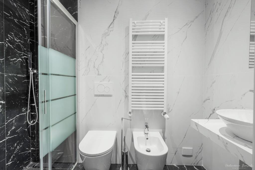 Koupelna v ubytování Hotel Adamas