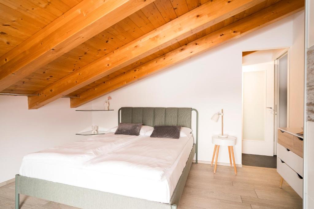 Aosta Holiday Apartments - Gressanにあるベッド