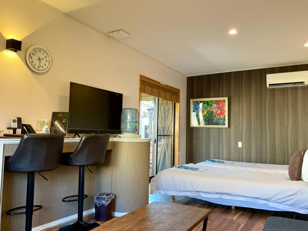 TV a/nebo společenská místnost v ubytování Ducale Garden Hotel Kujukuri