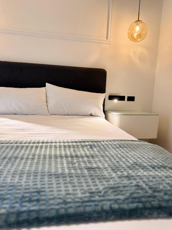 Postel nebo postele na pokoji v ubytování Hotel Boutique Las Mesetas