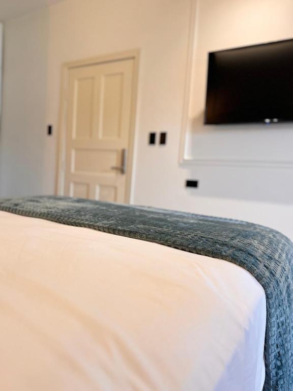 Postel nebo postele na pokoji v ubytování Hotel Boutique Las Mesetas