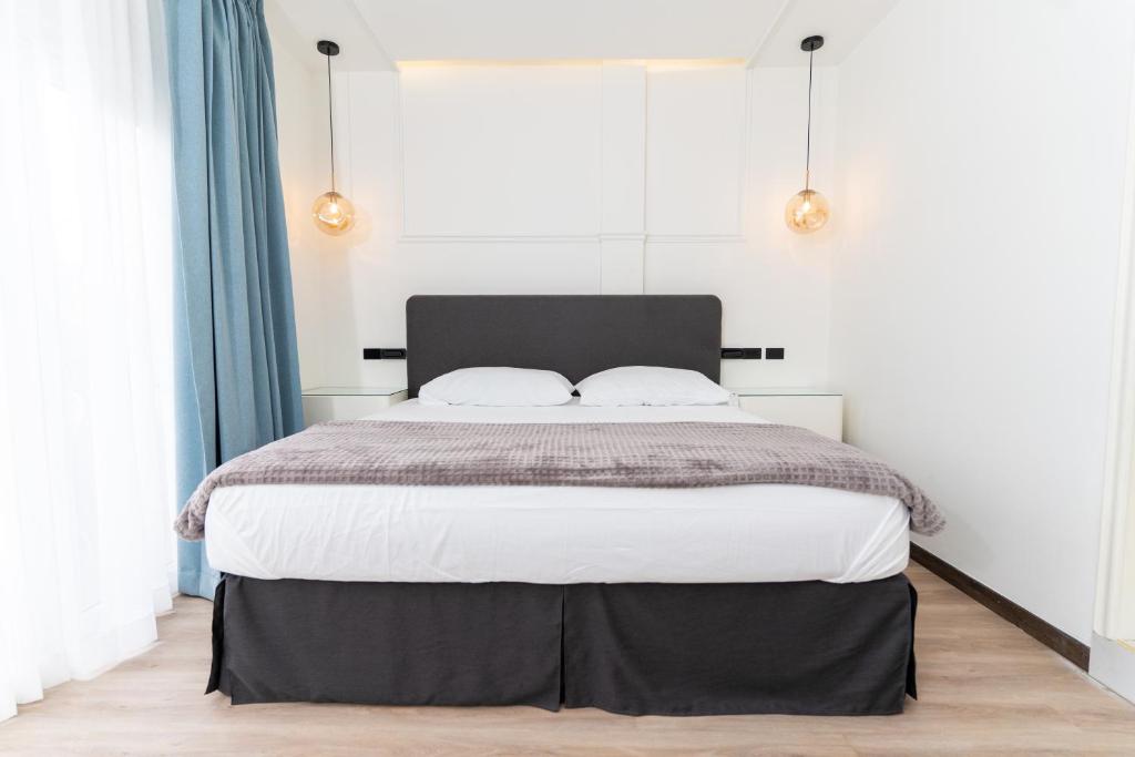 Postel nebo postele na pokoji v ubytování Hotel Boutique Las Mesetas