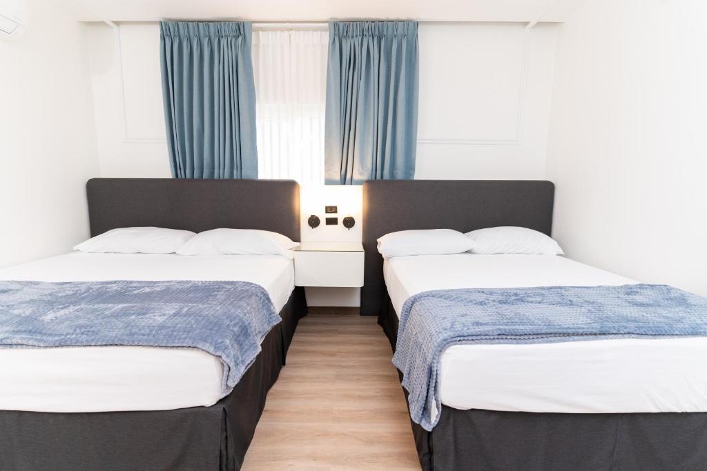 Postel nebo postele na pokoji v ubytování Hotel Boutique Las Mesetas