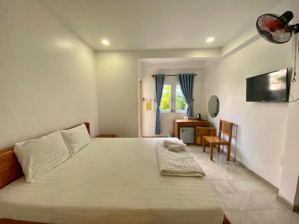 Postel nebo postele na pokoji v ubytování ღ Orchid Guesthouse ღ 5 minutes to the Beach & Night Market ღ