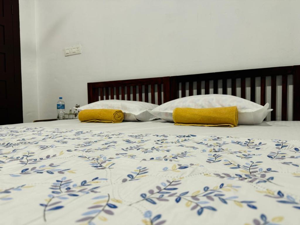 Postel nebo postele na pokoji v ubytování Marari Helen Villa