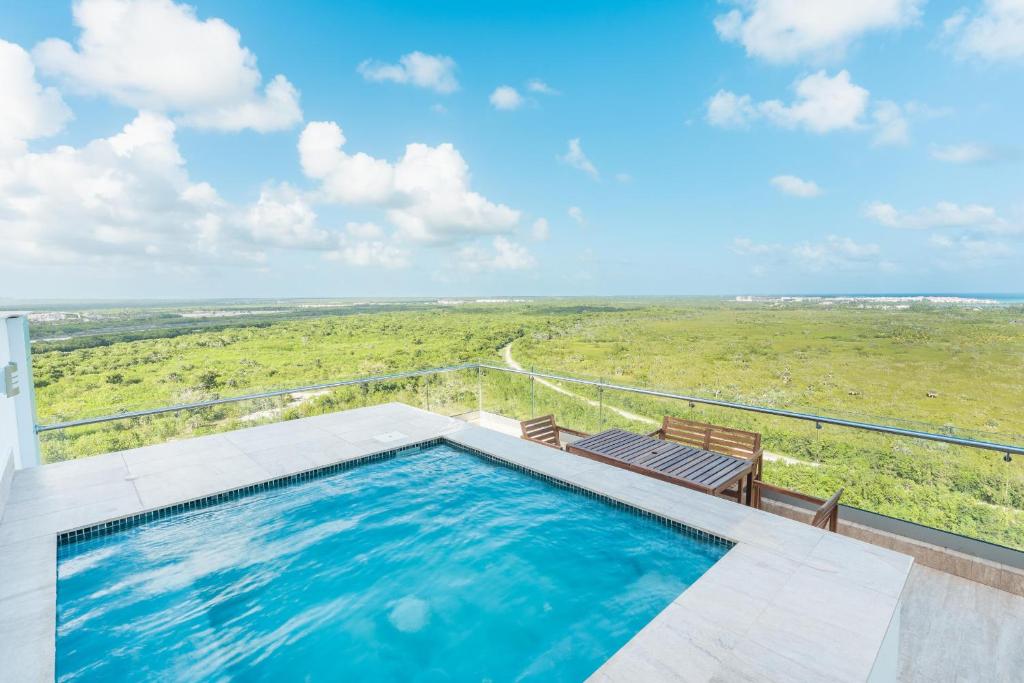 Fotografija u galeriji objekta Penthouse with 3BR and pool in Cap Cana u Punta Kani