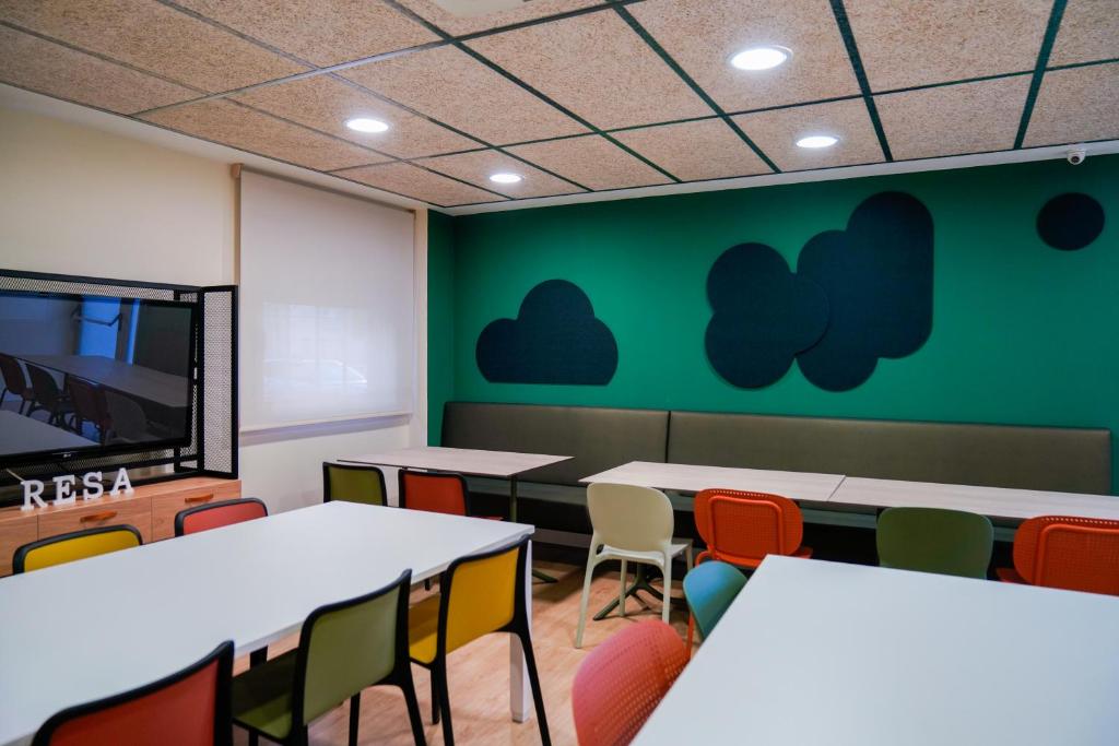 TV a/nebo společenská místnost v ubytování Residencia Universitaria Resa Los Abedules