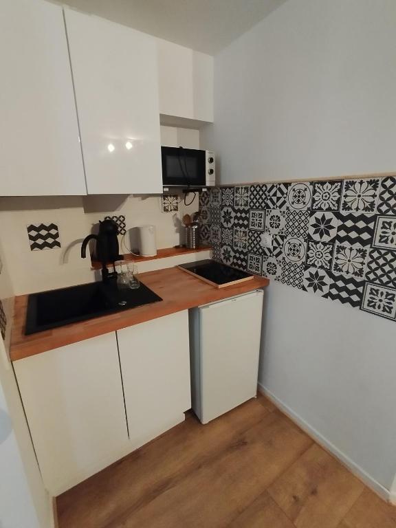 Kuchyň nebo kuchyňský kout v ubytování Studio Porteille d'Ax entièrement rénové !