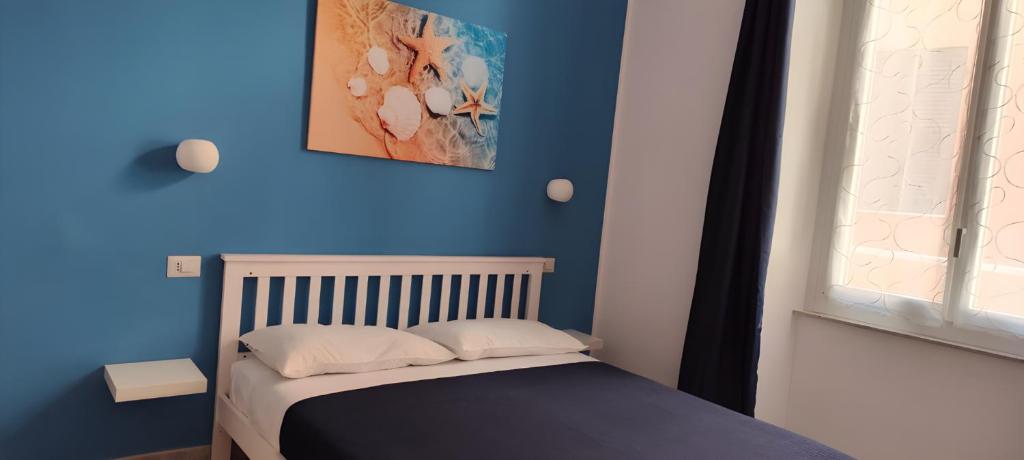 Postel nebo postele na pokoji v ubytování Le Quattro Stagioni
