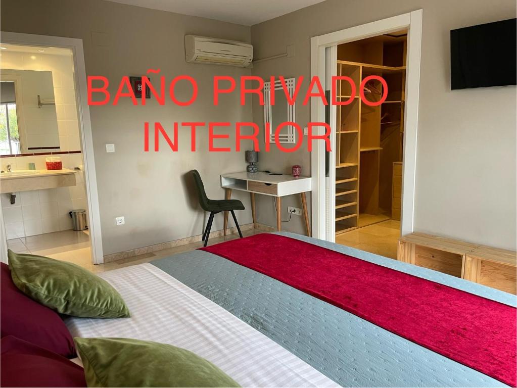 Postel nebo postele na pokoji v ubytování San Miguel B&B Granada
