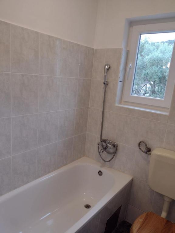Koupelna v ubytování Apartment Griv