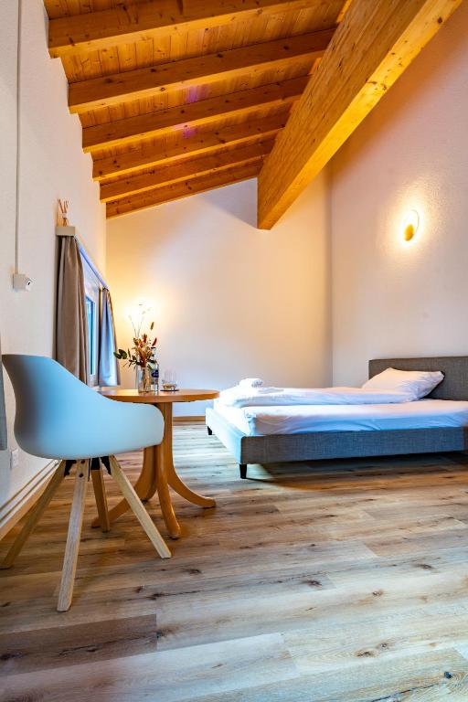 Postel nebo postele na pokoji v ubytování Hotel Restaurant Simplon