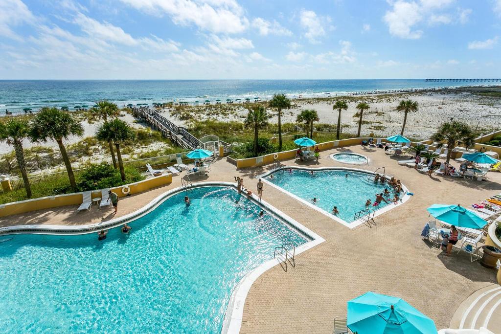 an overhead view of a pool at the beach at Emerald Isle Gulf Front 3B Condo - 301 in Pensacola Beach