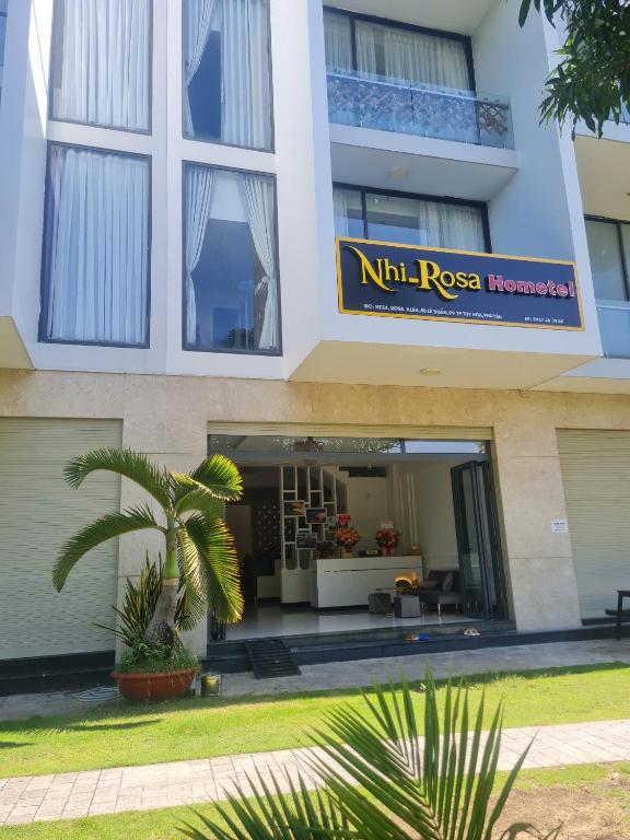 a building with a sign that reads therapy at Khách sạn Nhi Rosa Phú Yên in Liên Trì (4)
