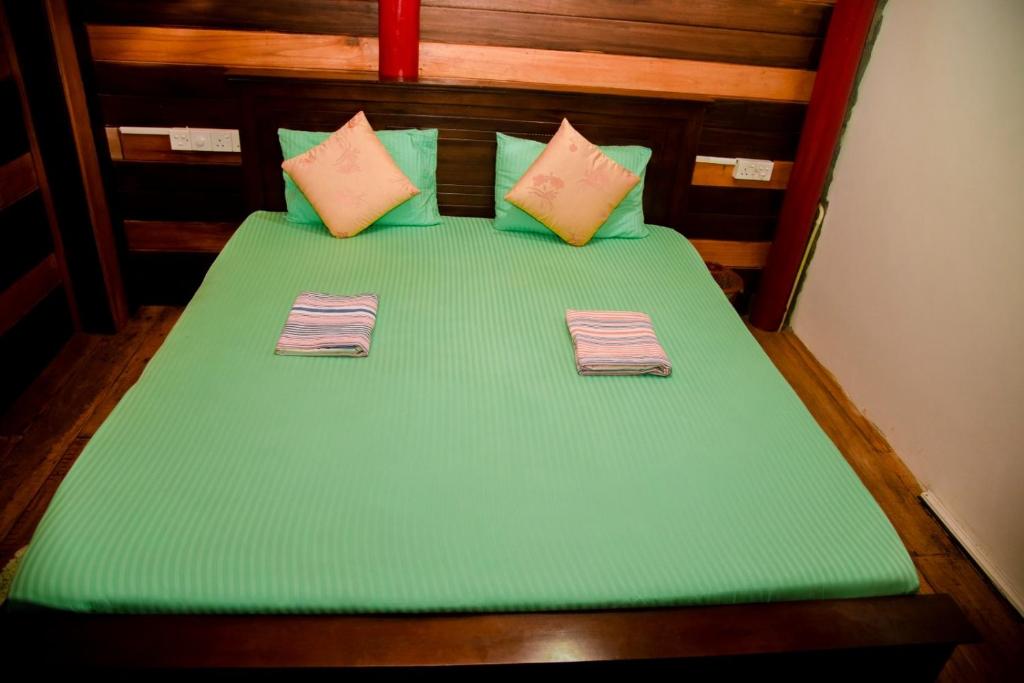 Postel nebo postele na pokoji v ubytování Anju Beach