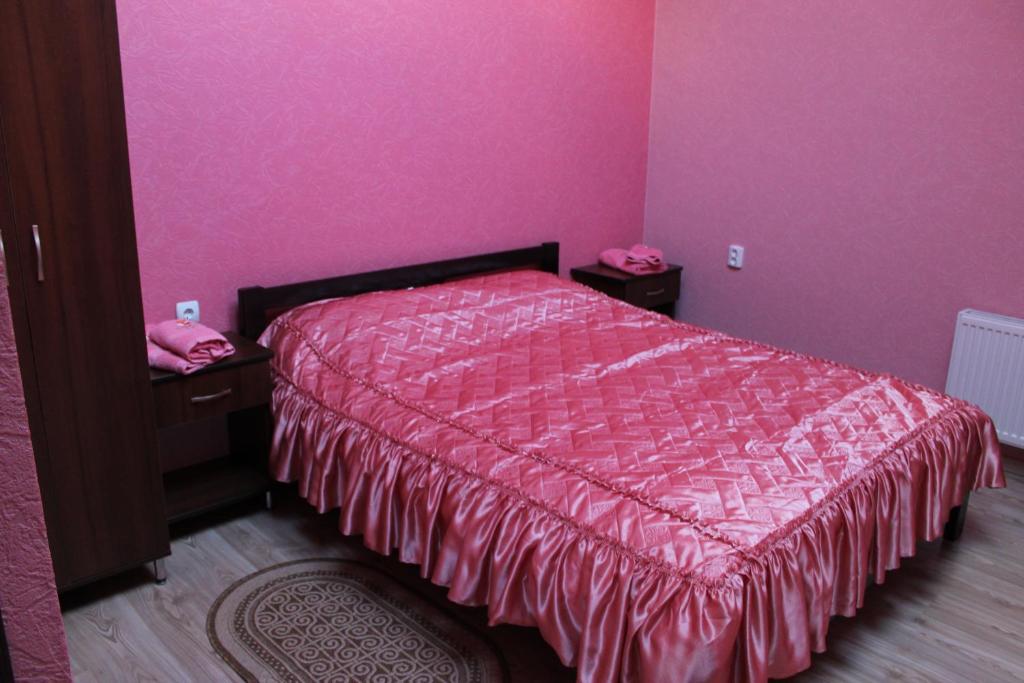Postel nebo postele na pokoji v ubytování Troyanda