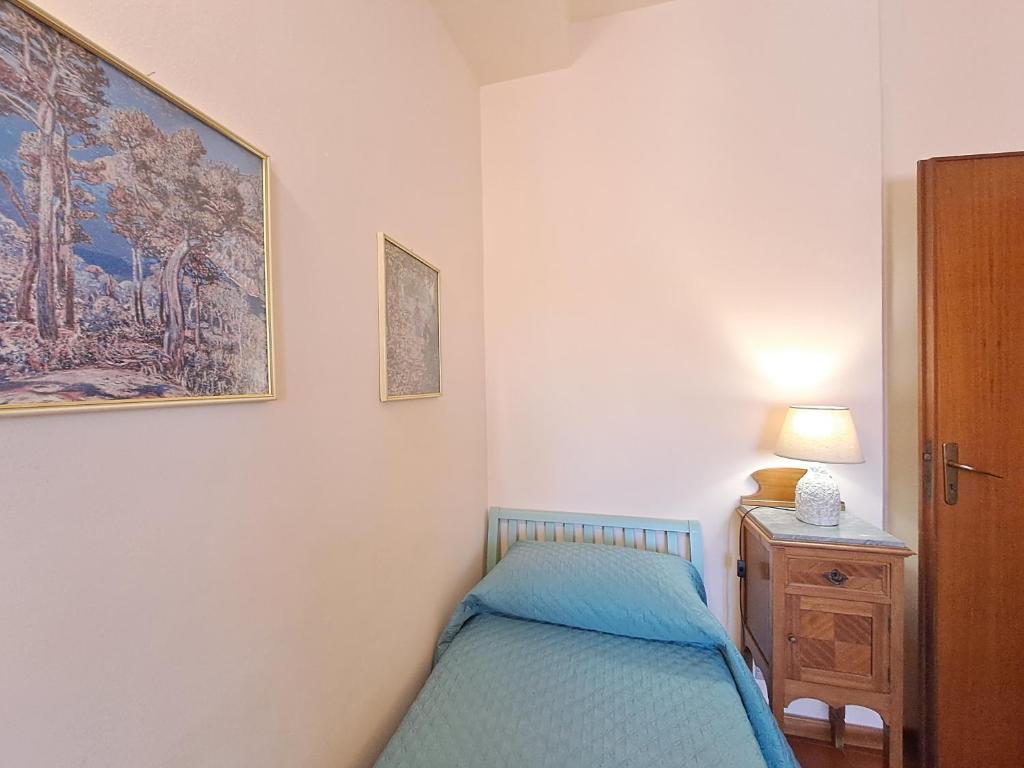 Posteľ alebo postele v izbe v ubytovaní Mirèa Apartment by Casa in mente