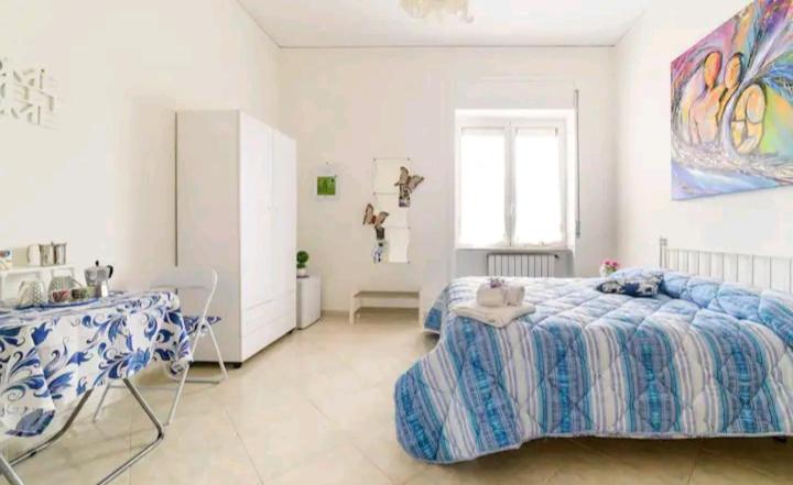A bed or beds in a room at Il Soffione Home