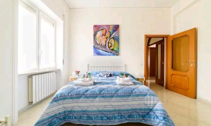 A bed or beds in a room at Il Soffione Home