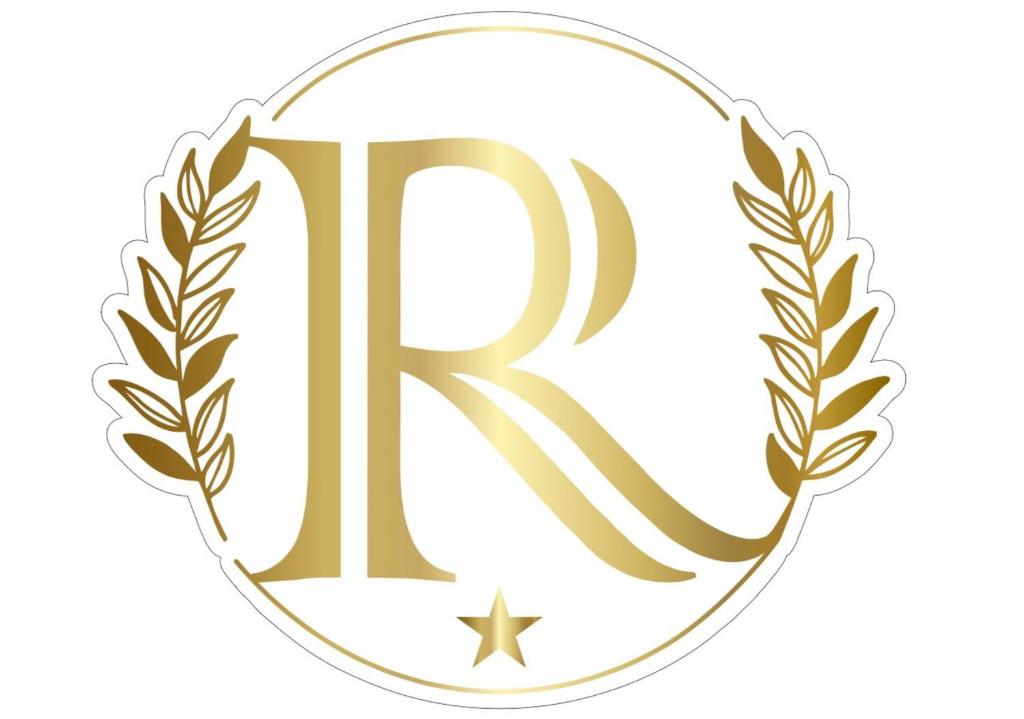 a gold laurel wreath and initial r in a gold medal at موتيل رامي سكاي Motel Rami Sky in Erbil