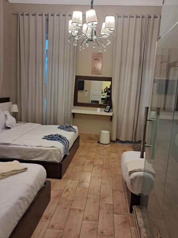 Postel nebo postele na pokoji v ubytování Grand Agor Hotel Cairo
