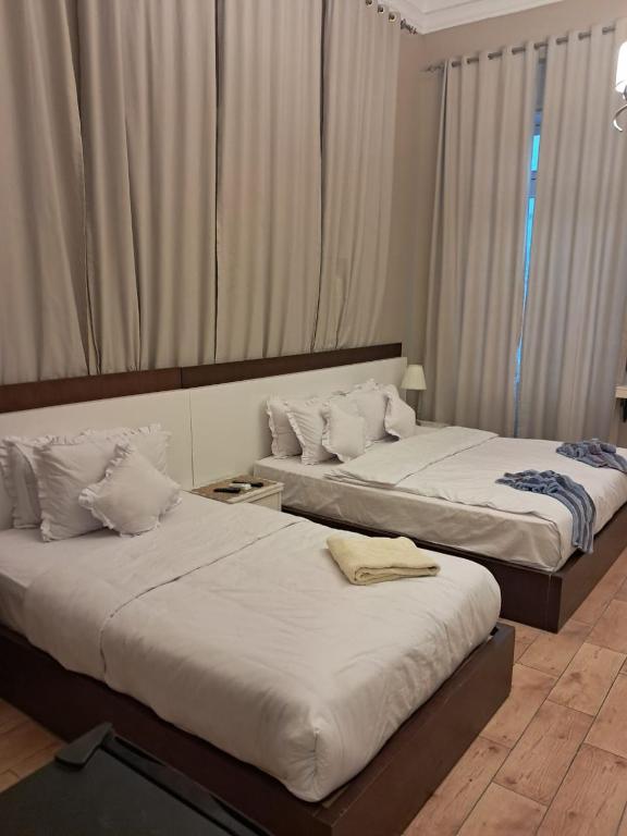 Postel nebo postele na pokoji v ubytování Grand Agor Hotel Cairo
