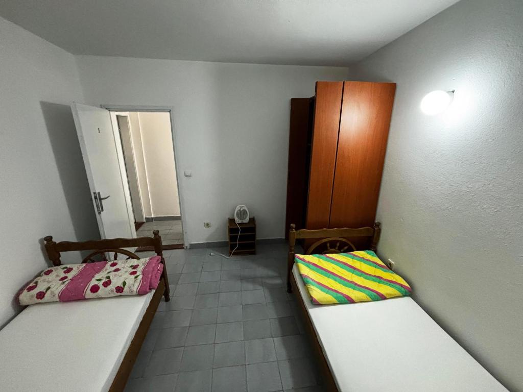 Postel nebo postele na pokoji v ubytování Stone Villa