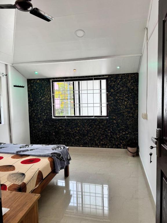 Postel nebo postele na pokoji v ubytování Dream House FORT KOCHI