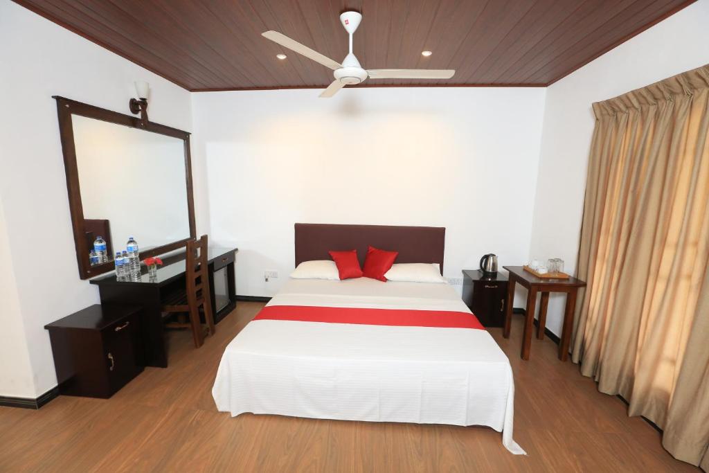 Una cama o camas en una habitación de Pavona Lake