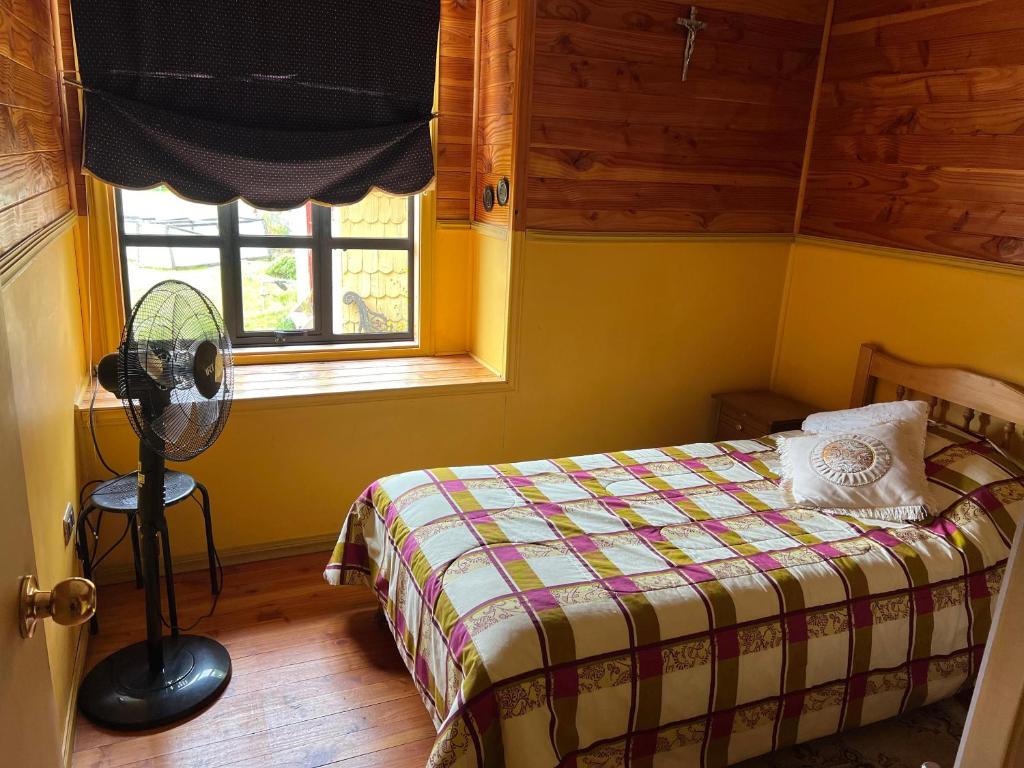 A bed or beds in a room at Cabaña Nalhuitad2
