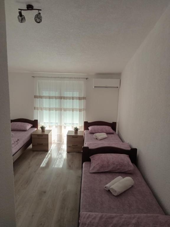 Postel nebo postele na pokoji v ubytování Zeppelin