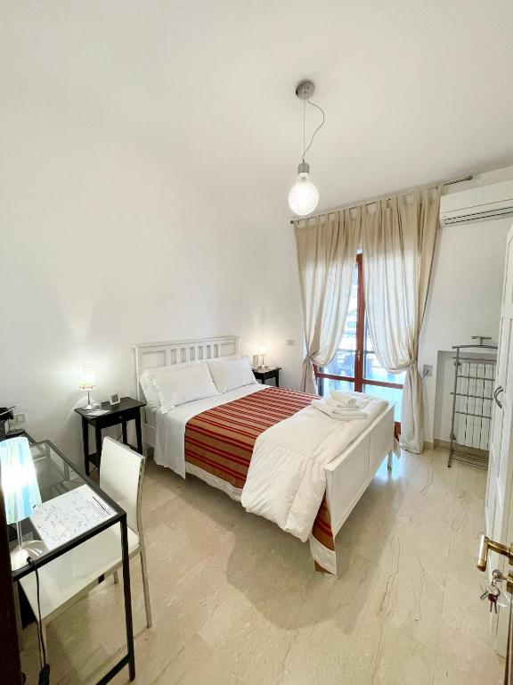 Postel nebo postele na pokoji v ubytování B&B Le Saline