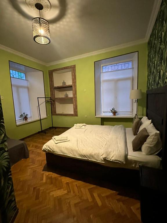 Postel nebo postele na pokoji v ubytování GT Boutique Hotel