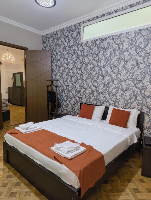 Postel nebo postele na pokoji v ubytování GT Boutique Hotel
