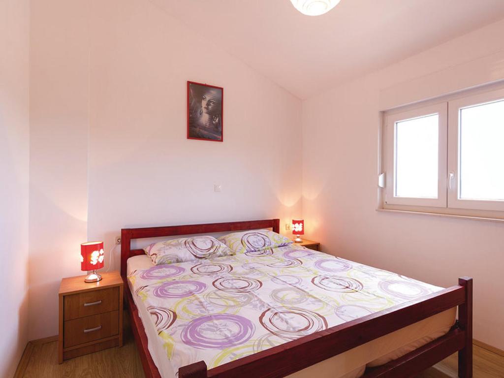 Postel nebo postele na pokoji v ubytování Villa Patricia