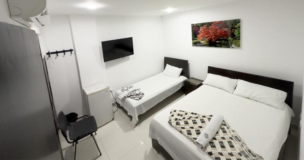 Postel nebo postele na pokoji v ubytování Hotel Big New York