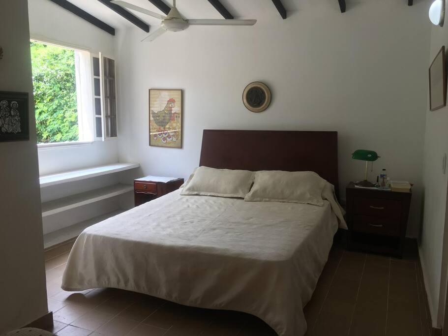 Voodi või voodid majutusasutuse Finca en Anapoima toas