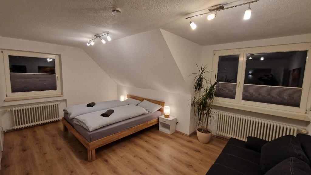 Postel nebo postele na pokoji v ubytování Blütenlodge Bodensee