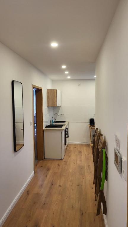 Kuchyň nebo kuchyňský kout v ubytování Reload Apartments - FeWo3 im Remmeker Feld